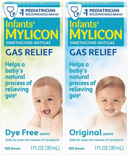 Two Infants' Mylicon Gas Relief boxes side by side. The left box is "Dye Free Drops" with a smiling baby, and the right is "Original Drops" with another smiling baby. Both are 1 fl oz and for relieving babies' gas.